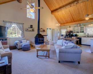 Caretaker-Living-Room-and-Woodstove-min